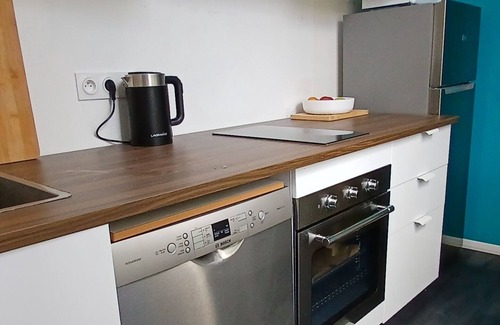 Beauvoir-sur-Mer Apartment | Le Chat Bleu apartment, adjoining owner's house shared garden