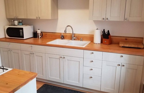 Centralia Apartment | Light filled downtown studio apartment with king bed.