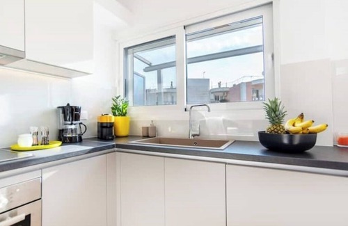 Galatsi Apartment | Light-flooded penthousenn