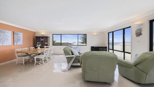 Emerald Beach House | Lighthouse at Emerald Beach - Ocean Views, walk to beach