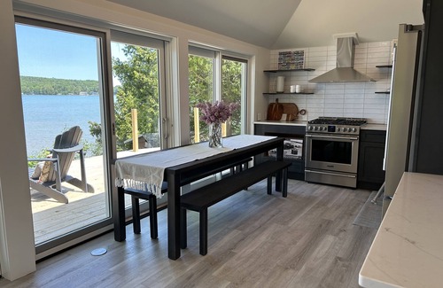 Empire House | Little Glen House with 100 feet of frontage, huge deck, dock, and boat mooring