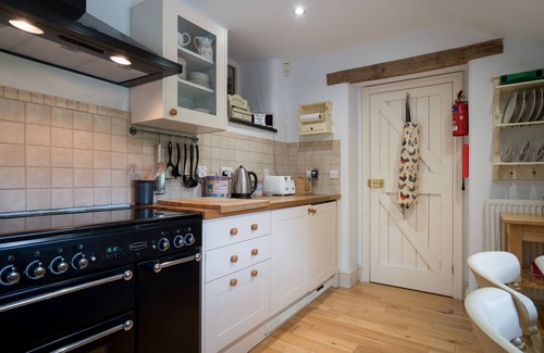 Eglwysbach Cottage | Lletty - An historic three-storey Grade II stone holiday farmhouse dating from the 17th century