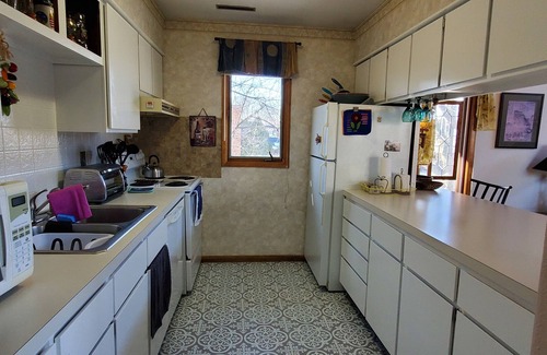 Cedar Falls Apartment | Local Comfort with Int'l Flair