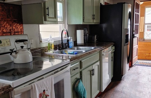 Winthrop House | Located directly in central downtown and beach area, fish or kayak from backyard