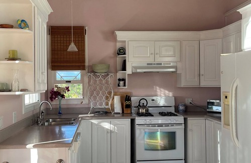Jessups Village House | Location, Location, Location Pinney’s Beach Nevis. 2 Bdrs, 2 1/2 Ba. w laundry!