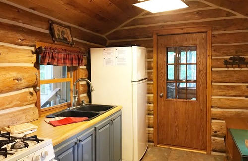 Stone Lake Cabin | Log cabin on 19 mile Long Lake, large screen porch + dock, 1 acre mature pines