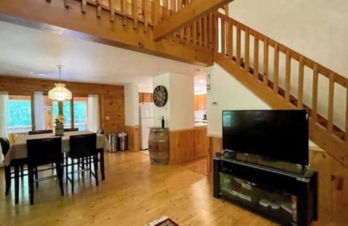 Riverside Estates Cabin | Log Cabin w/ Full Garage, FirePit, BBQ, cozy gas heat Stove