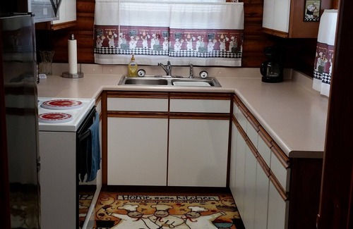 Millersport Cabin | Log Cabin Waterfront getaway at Buckeye Lake featured in the 2019 Tour of Homes