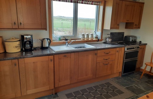 Spittal Cottage | Loneacre - a bungalow that sleeps 4 guests in 2 bedrooms