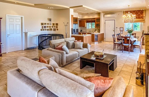 Lokroi House | Look forward to a breathtaking view from the sunny terrace of this vacation home with pool!
