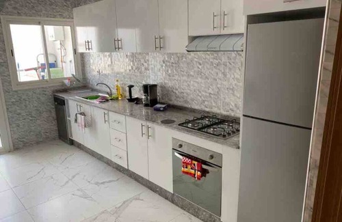 Harhoura Condo | Lovely 4-bedroom condo with pool