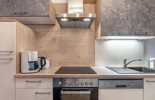 Arriach Villa | Lovely apartment in villa for 9 guests with WIFI, TV, patio and parking