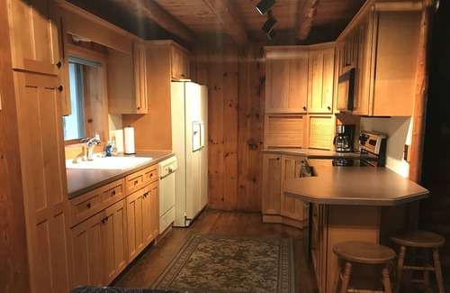 Lake House | Lovely lakefront log cabin on Eight Point Lake. Relax or have fun in the lake!
