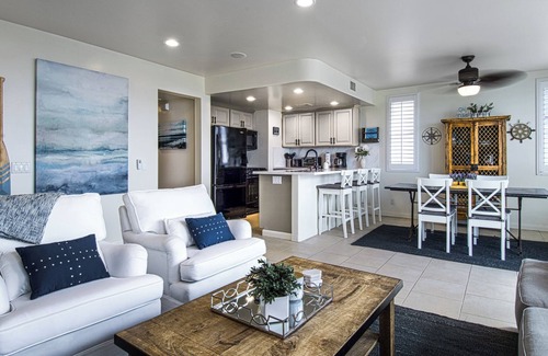 Santa Ana Heights Condo | Lovely lower unit with spectacular oversized patio right on the sand!
