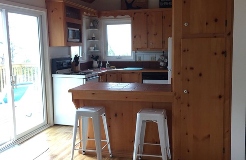 Souris Cottage | Lovely waterfront cottage on private white sand beach