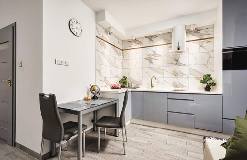 Baluty Apartment | Lumina studio with parking near Manufaktura