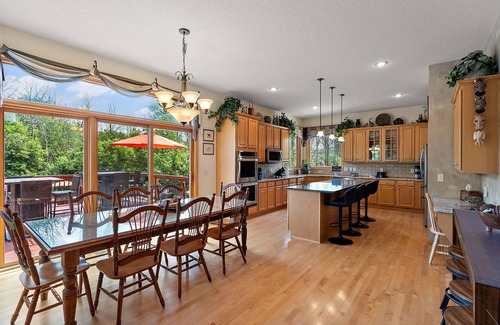 Lakeville House | Lux Retreat on 5 Wooded Acres-Pool/Hot Tub/Tiki Bar/Game Room- Great for Groups!