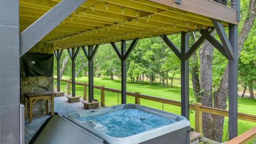 Lansing House | Lux Riverfront Retreat- Hot Tub, Game Room, Views!