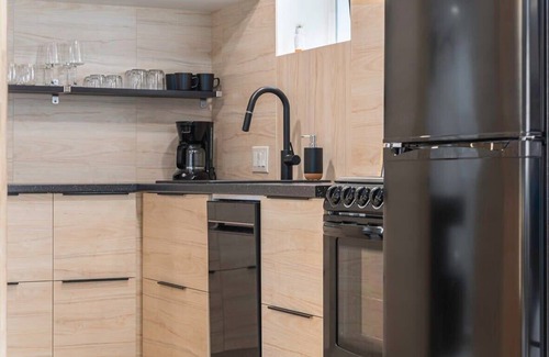 Aksarben - Elmwood Park Apartment | Lux Studio Oasis! Hot Tub, Cozy Heated Floors!