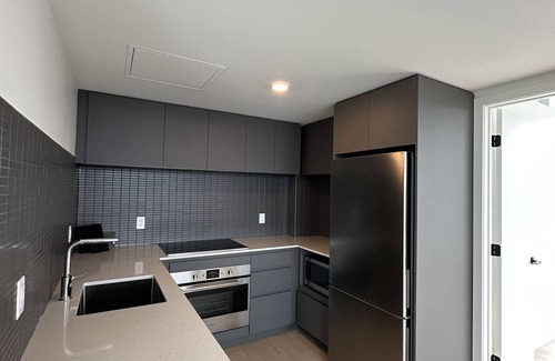Downtown Montreal Apartment | Luxurious Condo located with the front row views of the Place des Festivals.n
