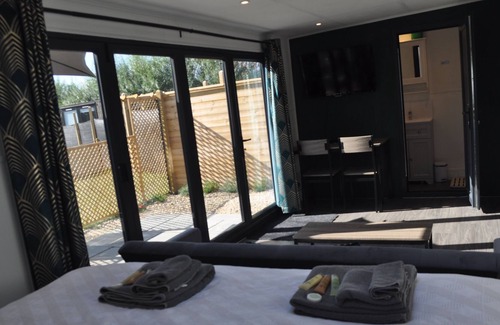 Chackmore Ski Chalet | Luxurious Pavillion with Skylight, Patio, and Quadruple garden door and ensuite