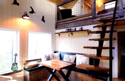 Springvale House | Luxurious Tree House with Hot Tub and Firepit, Perched over Littlefield Pond, Perfect for a Relaxing Weekend Getaway near Portland, Maine