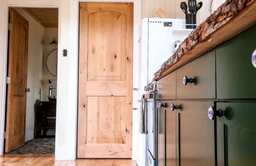 Springvale House | Luxurious Tree House with Hot Tub and Firepit, Perched over Littlefield Pond, Perfect for a Relaxing Weekend Getaway near Portland, Maine