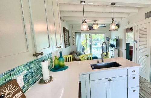 Key Colony Beach House | Luxurious Waterfront Oasis: 2BR, Private Heated Pool, Tiki, Dock