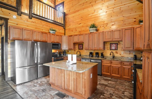 Gatlinburg - Pigeon Forge Cabin | Luxury 12BR/14BA Cabin w/Indoor Pool, Hot Tub, Arcade, & Theater! Perfect for Family Reunions!