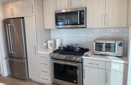 East Village Apartment | Luxury Designer Suite with Rooftop Pool, Gym