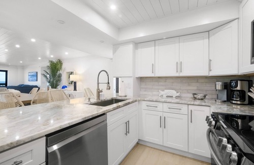 Ormond-by-the-Sea Condo | Luxury direct oceanfront corner with large private balcony, heated pool and garage