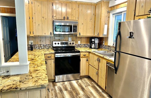 Maple Lake House | Luxury family escape- expansive beach, hot tub, and more