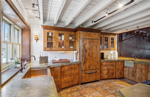 Downtown East House | Luxury Historic Home Next to US Bank Stadium. Private Courtyard + Rooftop.