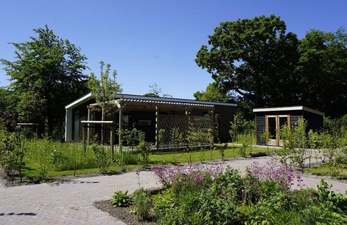 Sint Nicolaasga House | Luxury holiday home surrounded by water and forest