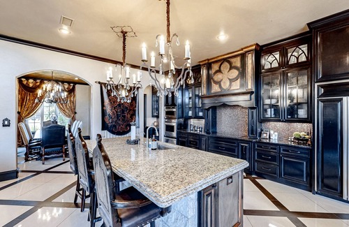 Lubbock House | Luxury home with private pool, waterslide, grill, home theater, & office