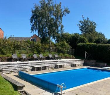 Overton-on-dee House | Luxury homely open-plan Barn with log burner & games room