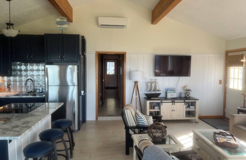 Silver Lake Cottage | Luxury Lakefront Family Retreat: Swimming, Kayaks, Bikes, Game Room, Hot Tub!