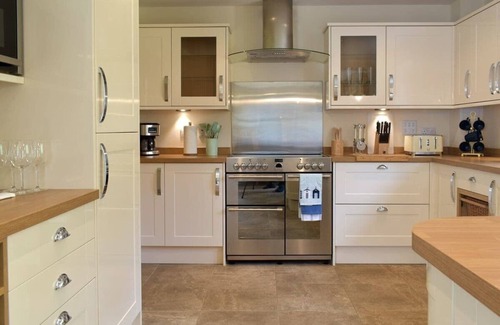 Carberry House | Luxury lodge, set in 40 acres of beautiful private gardens at Carberry Tower Estate.