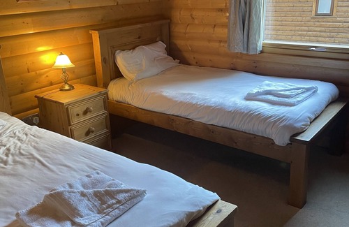 Kenwick Cabin | Luxury log Cabin With hot tub Overlooking the Kenwick Park Golf Course