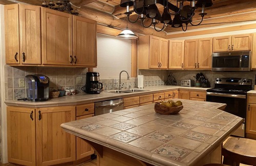 Pagosa Springs Cabin | Luxury Log Home with Hot Tub on 7+ Acres Featured In Log Home Digest. Sleeps 10