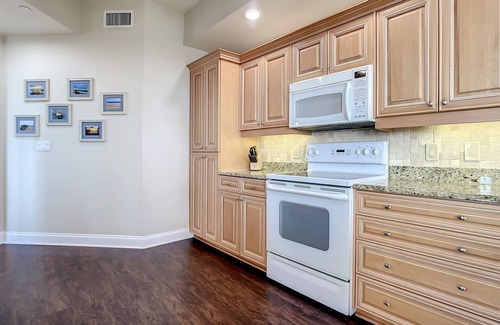 New Smyrna Beach Condo | Luxury Minorca ~ Corner Unit ~ Ocean & River Views! 2 Balconies! Paros 606