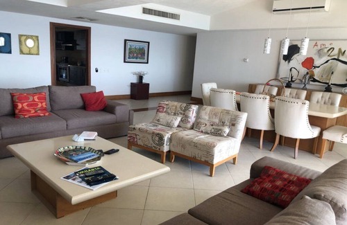 South Hotel Zone Condo | Luxury Oceanfront Apartment in Puerto Vallarta's Best Beach. 2 Large Pools, Gym