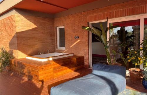Quartiere XI Portuense Apartment | Luxury penthouse with terrace and hot tub
