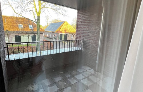 Goirle Apartment | Luxury retreat with modern décor, parking, and fast WiFi close to nature trails. Sleeps four guests.