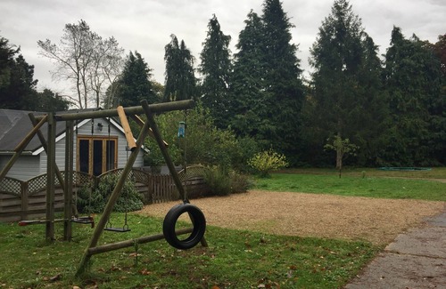 Sutton House | Luxury Single Storey Wooden Clad Colonial Style Cottage In Countryside Setting.