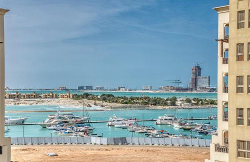 Al Hamra Village Apartment | Luxury Studio with Marina View Al Hamra Village