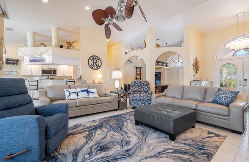 Burnt Store Isles House | Luxury Tropical long waterfront view w/bikes,kayaks,golf clubs,beach gear incl.