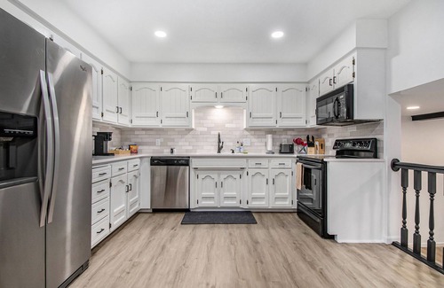 West Omaha House | Luxury vacation house, heated pool + hot tub