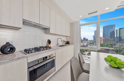 West Loop Apartment | Luxury West Loop Stay: Modern Suites w/Balcony, Resort Amenities & City Views