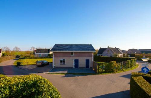 Tzummarum Villa | Luxus Familienvilla mit Jacuzzi & Sauna